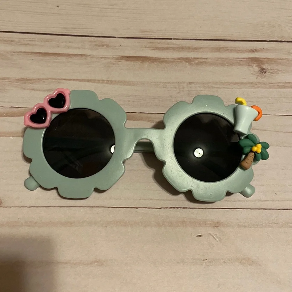Girls greyish sunglasses w charms